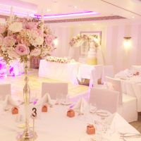 Pink and lilac tall candelabra wedding centrepieces with roses flowers Cherie Kelly London Sofitel St James