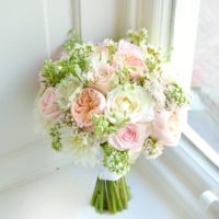 Peach David Austin roses, white dahlias, sweet avalanche, frilly scabiosa and wax flowers bridal bouquet Cherie Kelly Knowsley Hall