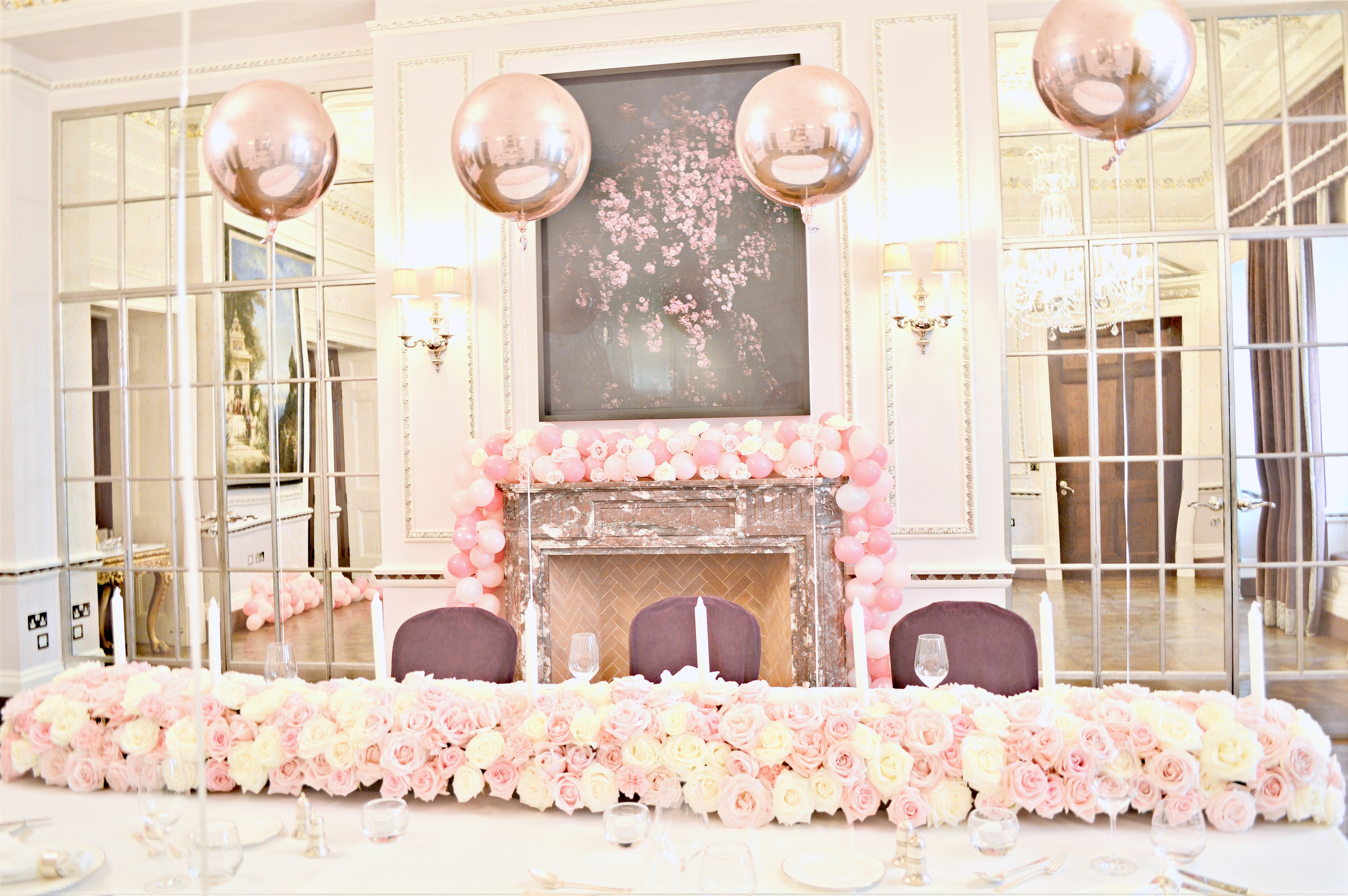 Pink, White and Rose Gold Themed Birthday Wedding Cake, Flower Runner Arrangements and Balloon Garland at The Connaught London Cherie Kelly
